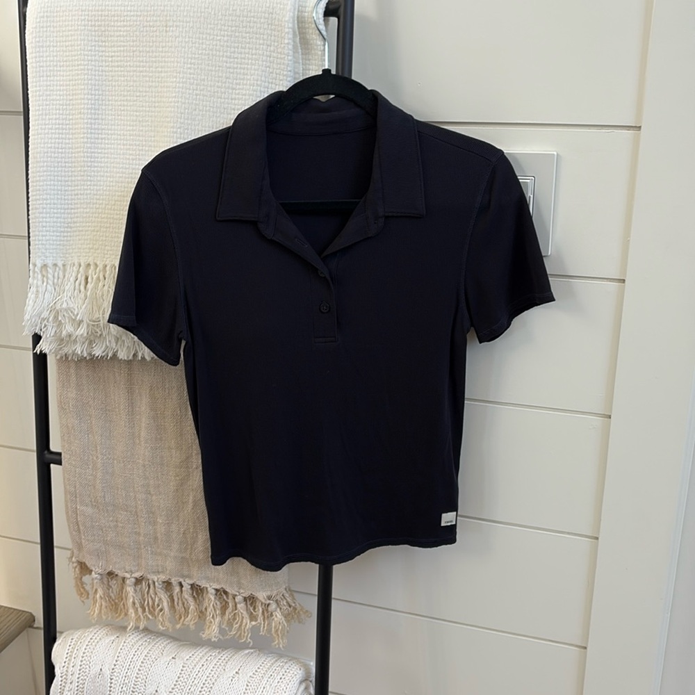 Vuori Black Polo top. Size L.